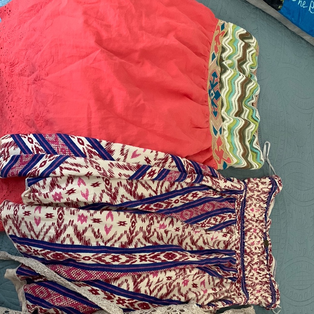 I am selling 2 dresses that are flying tomato and it’s a western company.
